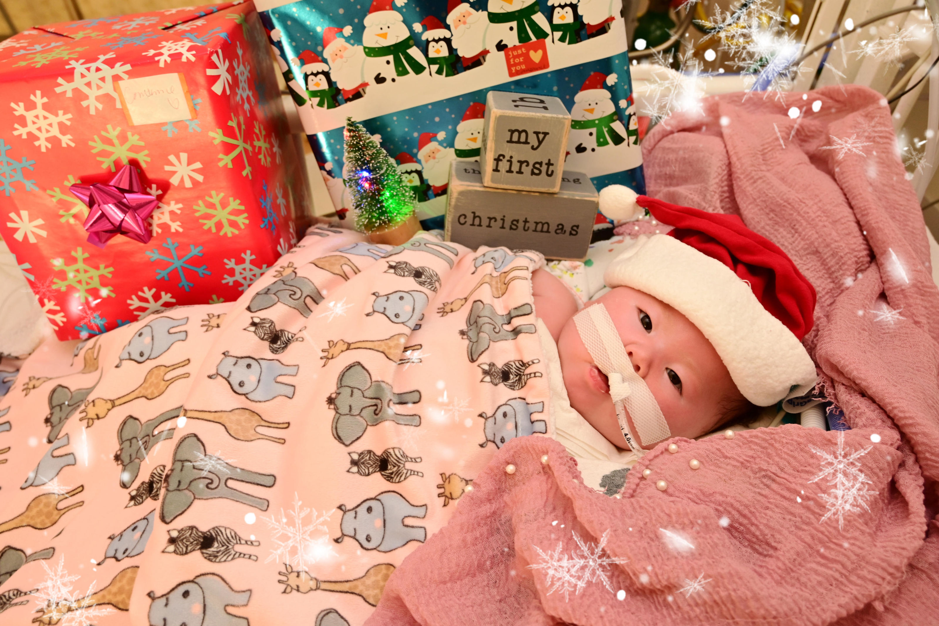Image of Constance with blocks written 'My first Christmas'